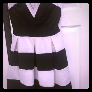 Black and white strapless dress.